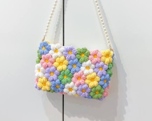 Handmade Crochet Bag Featuring a Burst of Multicolor Flower Patterns : Stylish Handcrafted Crochet Bag with Floral Design