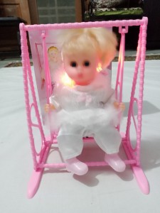 Swinging Doll - Battery operated - Music with Swing